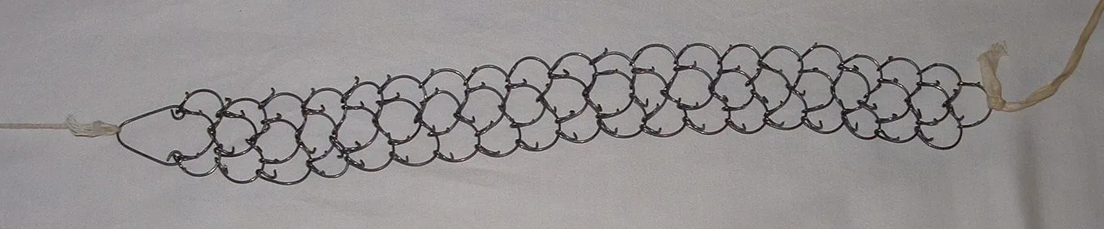 A cilice — a spiked chain used for corporal mortification