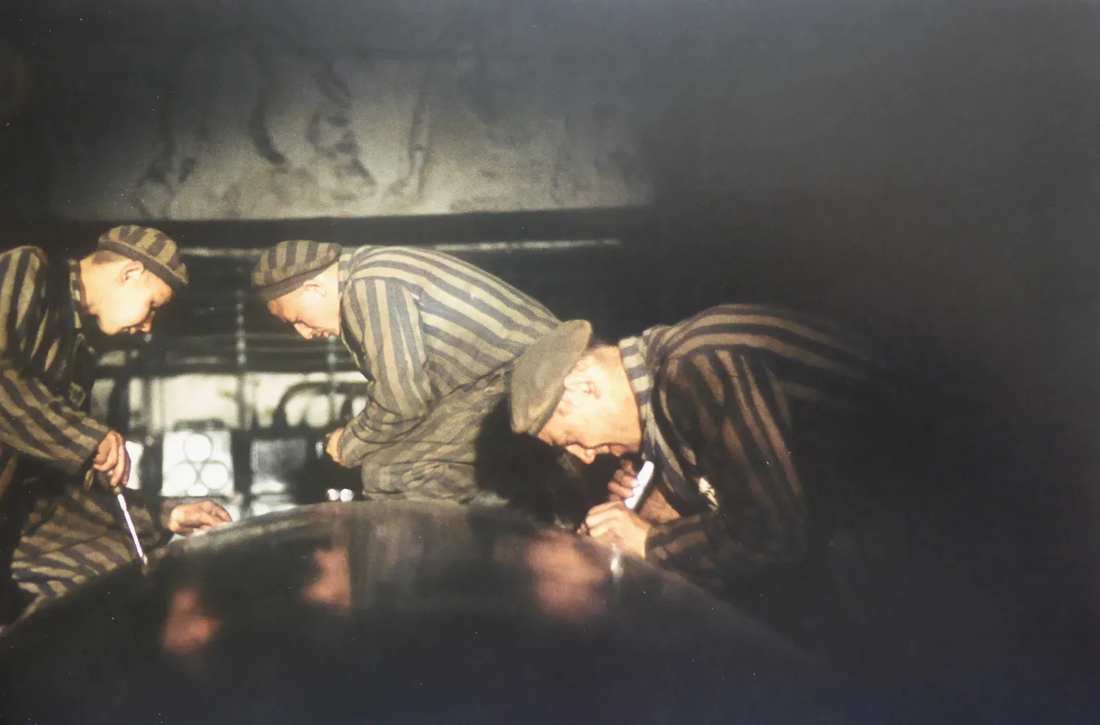 Concentration camp prisoners assembling V-2 rockets at the Mittelwerk underground factory