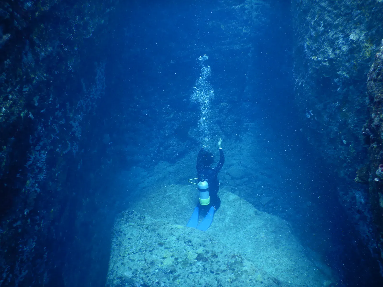 Diver examining the Yonaguni Monument