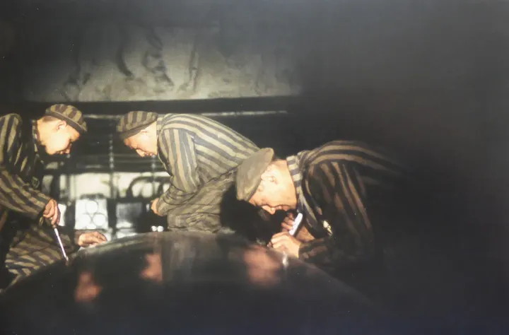 Concentration camp prisoners assembling V-2 rockets at the Mittelwerk underground factory