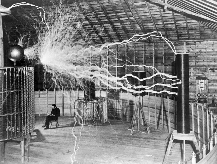 Nikola Tesla in his Colorado Springs laboratory