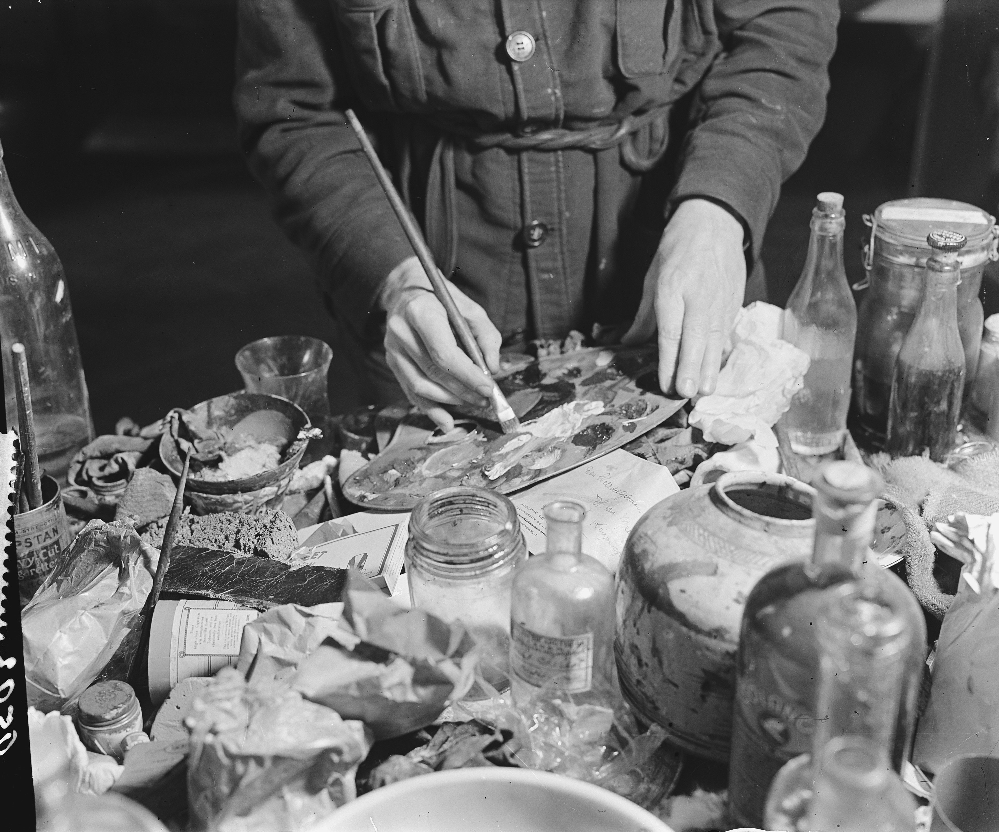 Van Meegeren painting under police supervision, 1945